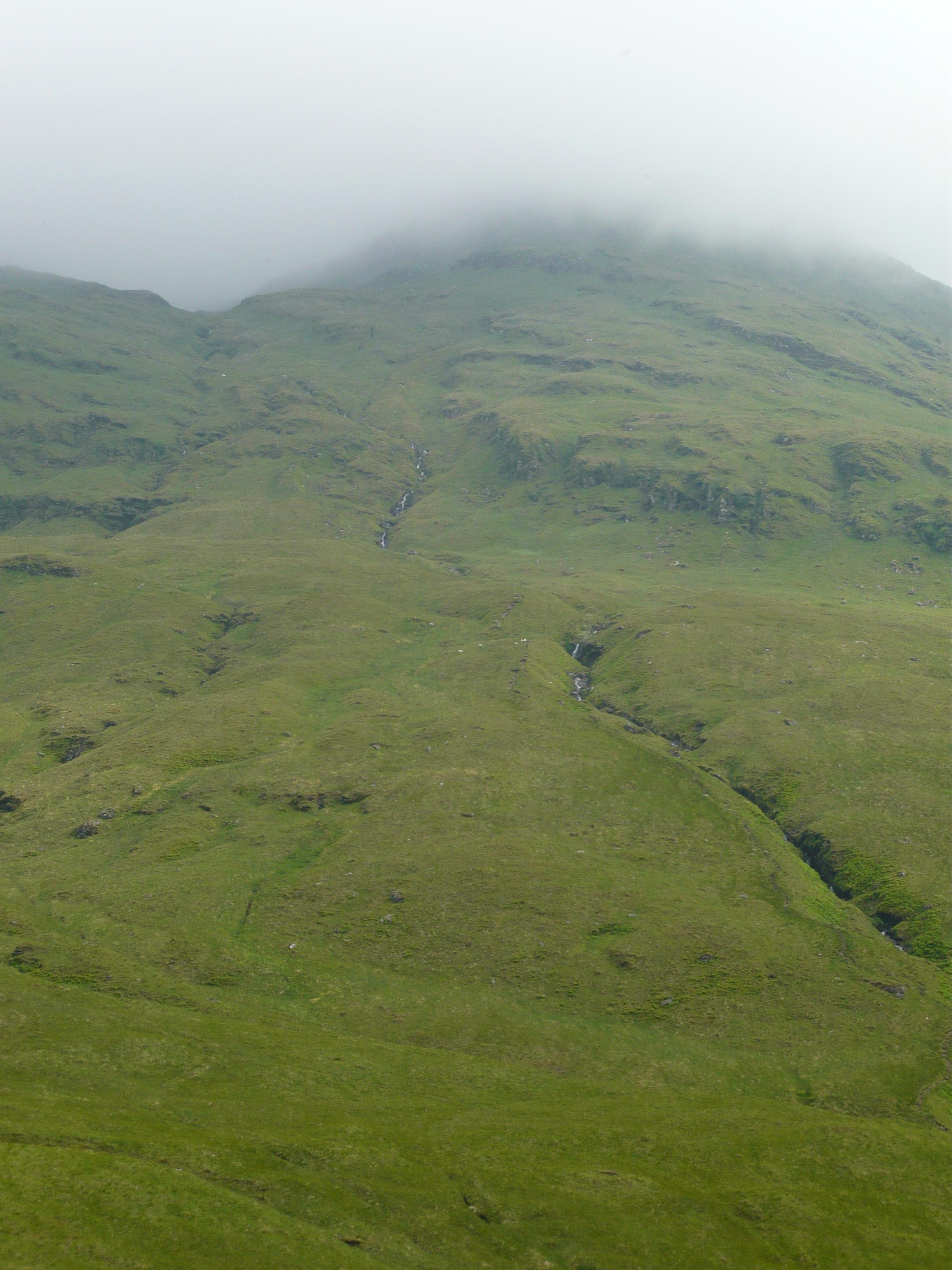Walking up into the mist on Ben Lui